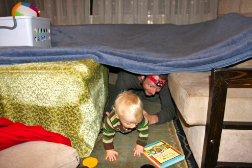 Reading the Christmas Story in our "fort"